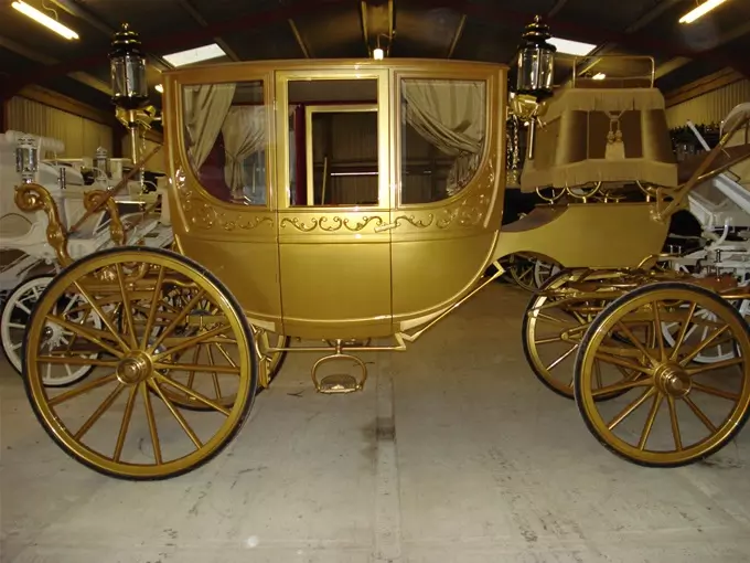 Golden Cinderella horse and carriage
